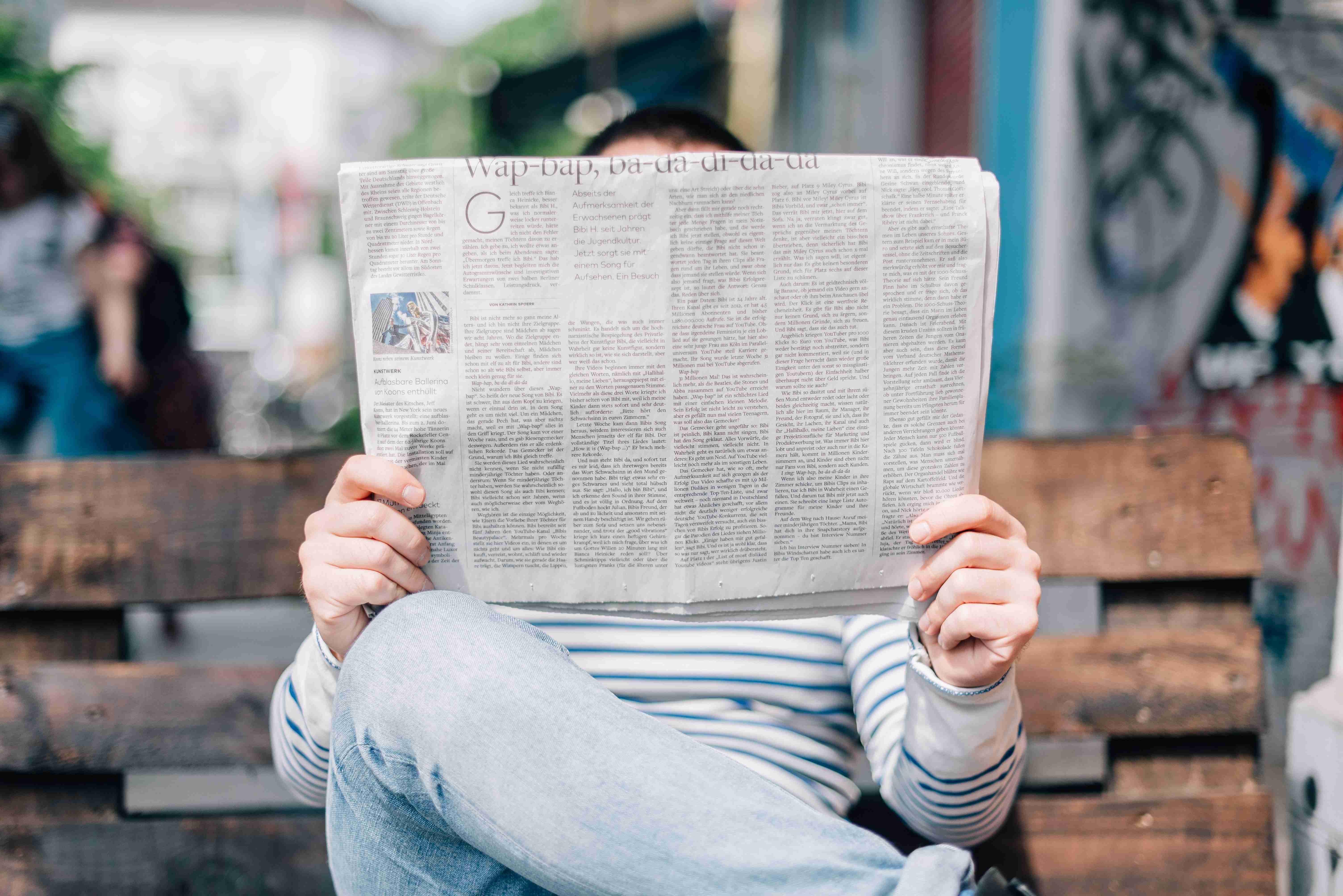 Someone reading the daily news